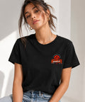 Schwarzes Unisex T-Shirt mit großem orange-weißem AFTERLIFE PARADISE Backprint, Palmen-Sonnenuntergang und Streetwear-Design an einem Zaun.